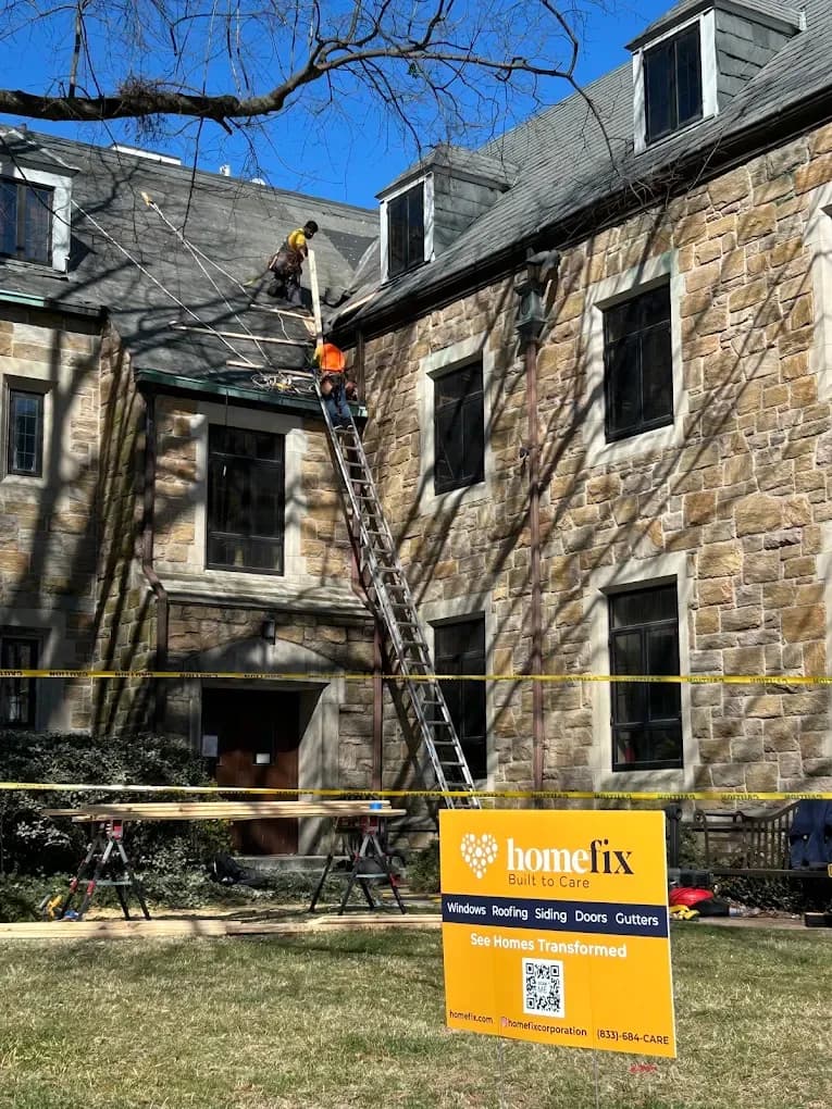 Homefix roofers fixing a roof on a home in MD